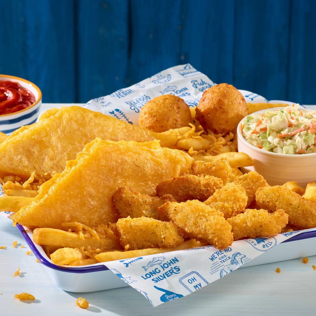 Lobster Bites & Fish Platter · Buttery, fried Norway Lobster Bites with two pieces of classic-battered Alaska pollock. Comes with 2 sides and 2 hushpuppies.
