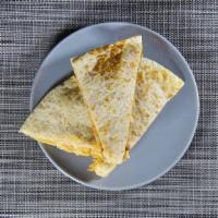 Regular Quesadilla · Served with cheese and flour tortilla.
