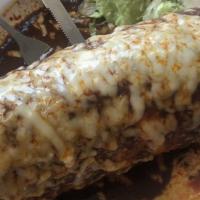 Burrito 1 · Egg, Chorzio, Refried Beans, Salsa and cheese
