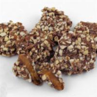 1 lb. Almond Butter Crunch Toffee · Talk about a mouthful rich, buttery, crunchy toffee covered in milk chocolate and rolled in ...