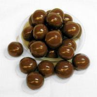 Malted Milk Balls, Milk Chocolate · A crisp malted center drenched in a layer of chocolate. 

Milk chocolate, sugar, chocolate l...