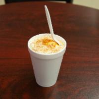 Elote en Vaso · Corn in a cup with mayo, Cotija cheese, butter, and chile pepper.