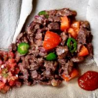 Lega Tibs · Sautéed with onion, garlic, jalapeno pepper, purified Ethiopian butter with Injera served wi...