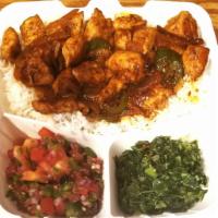 Chicken with Rice · Chicken breast cut in to cubes sautéed with onion Tomato garlic jalapeno black pepper served...
