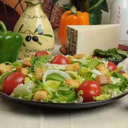 Tossed Salad · Romaine lettuce, tomatoes, green peppers, onions, and mozzarella.