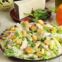 Chicken Caesar Salad · Romaine lettuce, grilled chicken, Asiago cheese, croutons, and Caesar dressing.