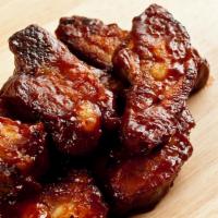 Rib Tips · Served with BBQ sauce on top.