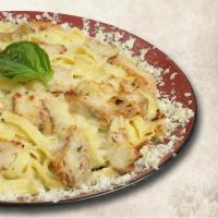 Chicken Fettuccine · Fettuccini pasta and grilled chicken with our creamy Alfredo sauce, Parmesan and mozzarella.