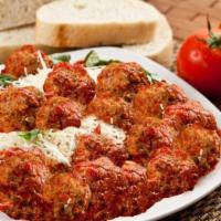 Meatballs on the Side · Topped with marinara sauce, mozzarella and Parmesan cheese.