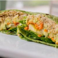 Hummus Wrap · Organic hummus and quinoa, avocado, along with sliced carrots and cucumber 