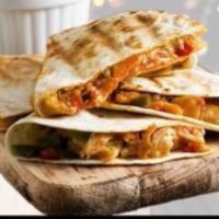 Chicken Quesadilla  · Quesadilla de Pollo is a wonderful Mexican recipe that is made with marinated chicken breast...