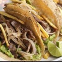 Carne Asada (Steak) Tacos · Authentic carne asada (steak) street tacos grilled, served on double corn tortillas with oni...