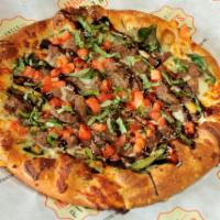 Steak and Blue Pizza · Garlic olive oil, grilled steak, mozzarella, blue cheese, Roma tomato, spinach, fresh basil,...