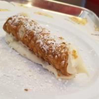 Handmade Italian Cannoli · Our famous, handmade to order cannoli. Mini-chocolate chips in a creamy filling topped with ...
