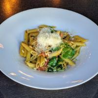 Penne Pasta · grilled chicken, oven roasted tomato, roasted red
pepper, spinach, pine nuts, basil butter ...