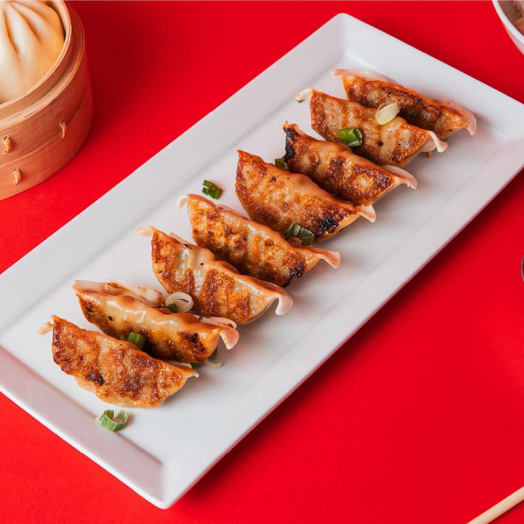 8 Pack Potstickers · Pan-seared with your choice of either Ginger Chicken or Green Vegetable filling.