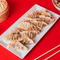 12 Pack Dumplings · Steamed with your choice of filling between Green Vegetable and Ginger Chicken.