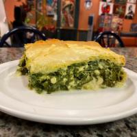 Spinach & Cheese Pie · Homemade served with rice, dinner Greek salad, and pita bread.