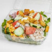 Chef's Salad · Lettuce or spinach, tomatoes, onion, cucumber, egg slices, turkey, ham, Swiss and American c...
