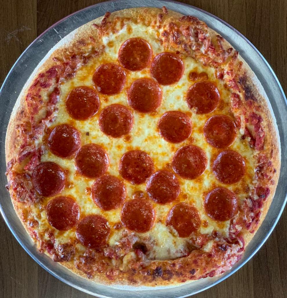 Pepperoni Pizza “14 · Medium-thin crust with red wine marinara.  Garlic/Pesto/Basil brushed crust, covered with mozzarella cheese and zesty pepperoni.
