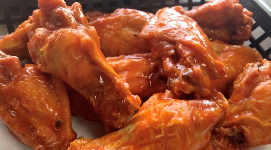 Basket of Wings · Our hot wings keep well and are a great choice for the trip to your house.   We have original Buffalo, Garlic Parmesan, Smoky BBQ and Carolina Reaper. 