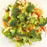 Asian Salad · Broccoli, carrots, red bell pepper, red onion, mixed greens, and sesame dressing.