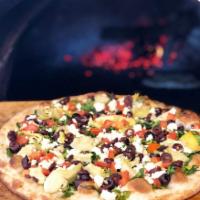 Mediterranean Pizza · Spinach, artichoke hearts, feta cheese, Kalamata olives, tomato, olive oil, and garlic.