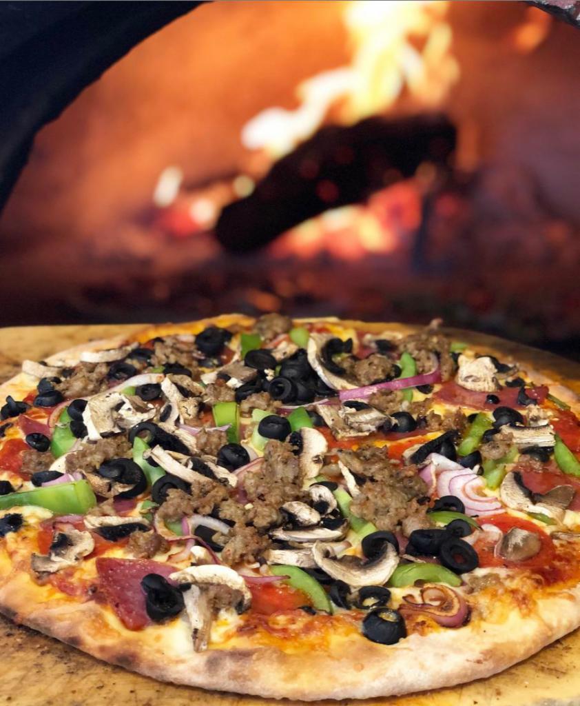 Pizza Deluxe Pizza · Salami, pepperoni, sausage, onion, green peppers, black olives, mushrooms, mozzarella, and red sauce.