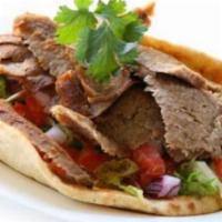 Gyro Sandwich · Cooked on a spit and wrapped in a pita. 