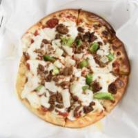 Philly Cheesesteak Pizza · Steak, cheese, and caramelized onion.