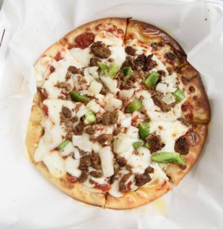 Philly Cheesesteak Pizza · Steak, cheese, and caramelized onion.