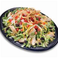 Chicken Fiesta Salad · Chicken, Black beans, Spanish rice, Lettuce, Cabbage, Cheddar cheese, Pepper Jack cheese, sa...