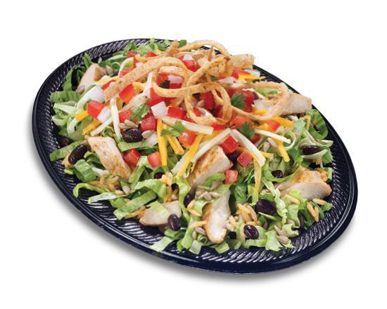 Fiesta Salad · Shredded lettuce and cabbage with seasoned rice, cheddar and pepper jack cheese, black beans, homemade salsa Fresca, sunflower seeds, all-white chicken and whole-wheat tortilla strips.