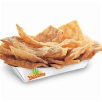 Cinnamon Crustos · Golden wedges of fried flour tortilla covered in cinnamon and sugar.