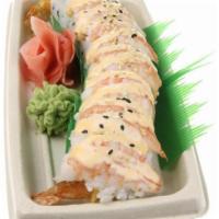 S17.	Tiger Roll  · Spicy Kani, mango inside, with salmon, avocado & Tanoshi special sauce