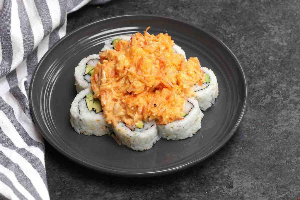 S19.	Volcano Roll	 · Deep fried roll with tuna, cucumber inside, with crab meat salad, eel sauce, spicy mayo 