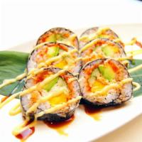 S21.	Paradise Roll · Shrimp tempura, cucumber, topped with seared salmon, spicy crab, Tanoshi special sauce 