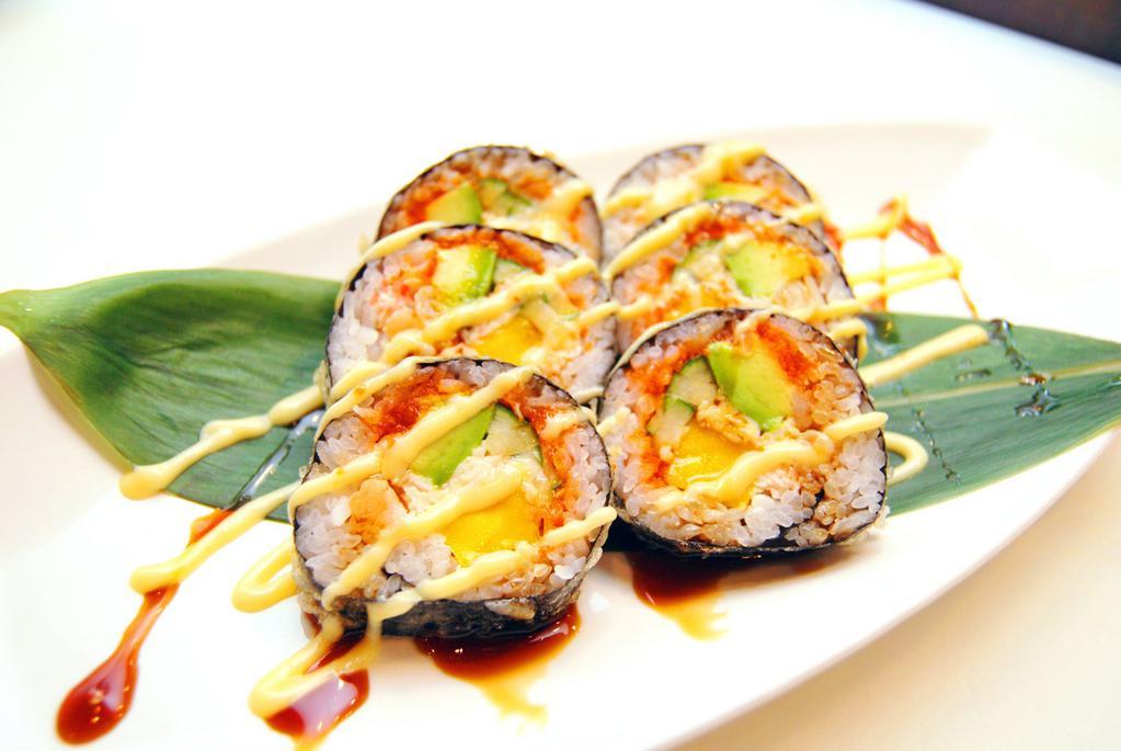 S21.	Paradise Roll · Shrimp tempura, cucumber, topped with seared salmon, spicy crab, Tanoshi special sauce 