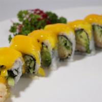 S22. Golden Dragon Roll · Mango on top of maki roll with shrimp tempura, avocado, cucumber 