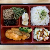 B09. Scottish Salmon Teriyaki Bento サーモン照り焼き弁当 · Main dish served with miso soup, house salad, rice and side dishes.