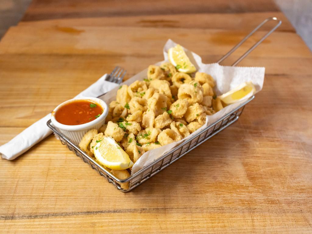 Crispy Golden Calamari  · Homemade marinara sauce.