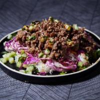 Bulgogi Beef · Thinly sliced marinated beef over cucumbers, cabbage, and choice of base and salad