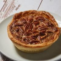 Chocolate Pecan Pie · Lightly toasted, buttery pecans sourced from Texas with a sweet chocolate bourbon custard. T...