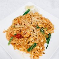 Pad Thai with Shrimp · Egg, scallions, bean sprouts and crushed peanuts.