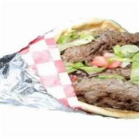4. Kafta Gyro · Ground beef, tomatoes, pickles, lettuce, onions, parsley and hummus.