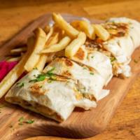 14. Chicken Arabi with Fries · Chicken shawarma arabi, wrap in saj bread. Cut to small bite size pieces and served on a bed...