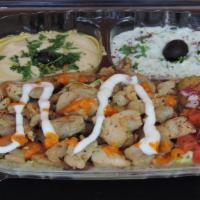 20. Chicken Shawarma Plate  · Marinated chicken served with salad and rice, onion, tomato, lettuce, tzatziki, hummus, mix ...