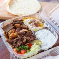 24. Tri- Meat Plate  · 3 types of meat, chicken, lamb, beef, rice, mix salad, tzatziki, hummus, mix spicy garlic sa...