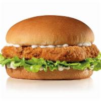 Spicy Chicken Sandwich · Spicy Chicken, lettuce, and mayonnaise on a plain bun.