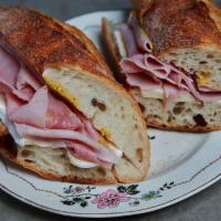 Ham and Brie Sandwich · A French staple, stacked Ham, Brie and mustard or butter. 